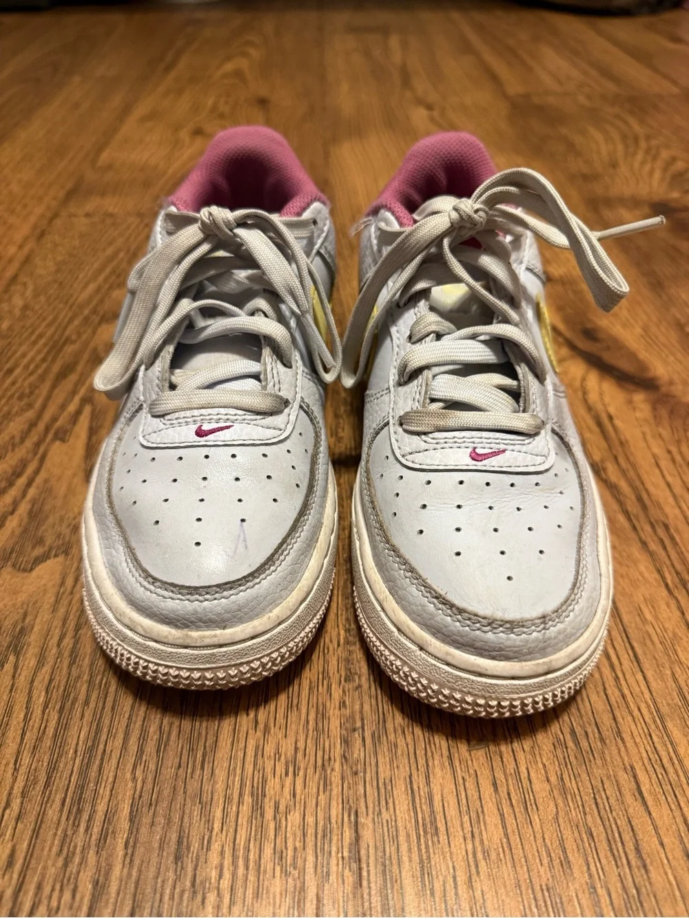 Nike Kids White Sneakers with Yellow Swoosh and Pink Lining